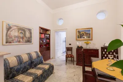 a living room with a couch and a table at Simon's place in Rome