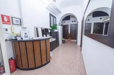 a large room with a bar in a building at Lemei House in Rome