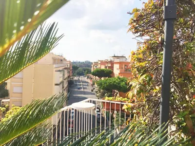 a view of a city street from a balcony at Roma Suite Balduina in Rome
