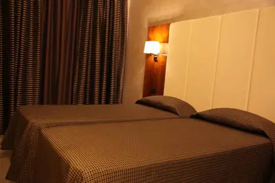 a bedroom with a bed with a light on it at B&B Federica's House In Rome in Rome