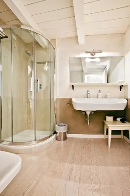a bathroom with a sink and a shower at LM Suites Spagna in Rome