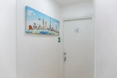 a picture hanging over a door in a room at Metronia Guest House in Rome