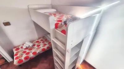 a bedroom with a bed and a bunk bed at Appartamento Fiore in Rome