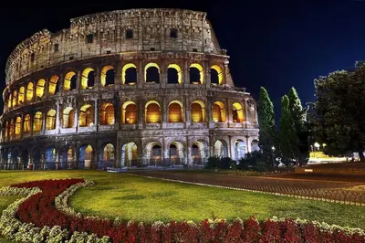 a view of the leaning tower at night at Lilli Home Holidays in Rome