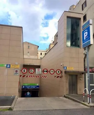 a building with signs on the side of it at Vatican Chic B&B in Rome