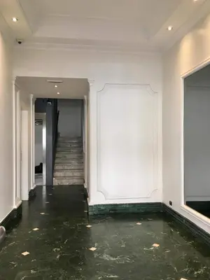 an empty hallway with a floor of water at Hotel Tito in Rome