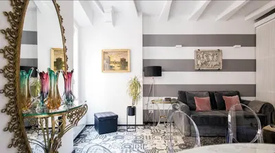 a living room with a couch and a table at Navona Hi-Tech Apartment in Rome