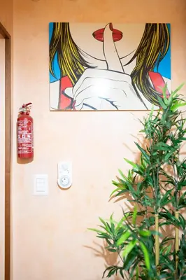 a painting of a woman on the side of a wall at ROMA18 in Rome