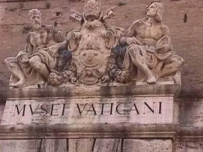a statue of two men on the side of a building at Rhome Accomodation in Rome