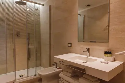 a bathroom with a sink and a toilet and a shower at My Spanishsteps in Rome