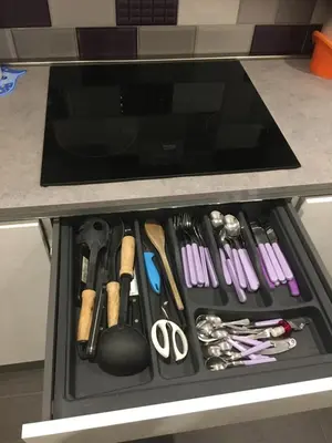 a drawer under a counter filled with cooking utensils at Saint Peter Basilica 200m- 2BR -2BA -Sleeps 6 in Rome