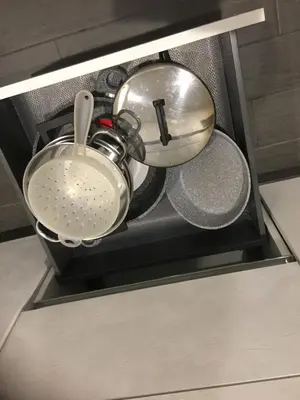 two pots and pans are sitting in a drawer at Saint Peter Basilica 200m- 2BR -2BA -Sleeps 6 in Rome