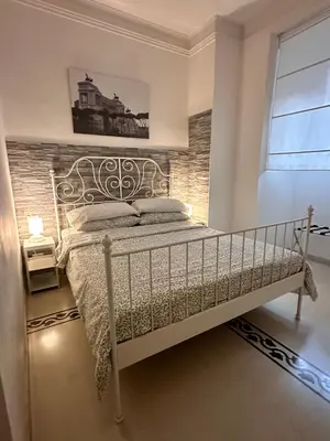 a bedroom with a bed in a room at Mio House Vatican in Rome