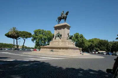 a statue of a man on a horse on a monument at HISTORICAL CENTER ROME NAVONA AC 2 ROOMS HOLY DOOR VATICAN 5 MINUTES ON WALk in Rome