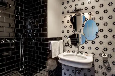 a bathroom with a sink and a mirror at The B Place in Rome