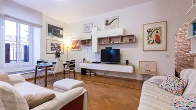 a living room with a couch and a tv at Rental in Rome Otranto Relax in Rome
