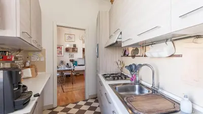a kitchen with a sink and a counter top at Rental in Rome Otranto Relax in Rome