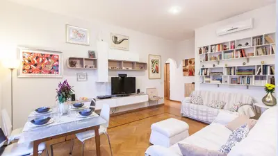 a living room with a couch and a table at Rental in Rome Otranto Relax in Rome