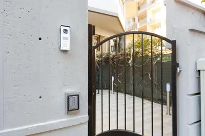 a gate leading to a building with a gate at Domus Arena in Rome