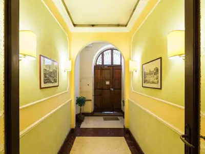 a hallway leading to a door in a house at Residenza Maritti Decò Style- Guesthouse in Rome