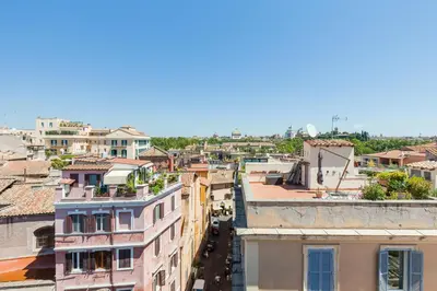 an aerial view of a city with buildings at Il Nascondiglio del Prete in Rome