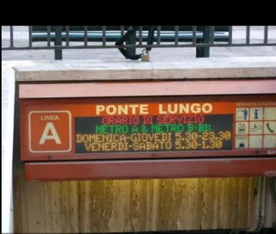 a sign on the side of a bridge at Long Bridge House in Rome
