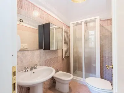 a bathroom with a sink and a toilet and a shower at Apartment Silla by Interhome in Rome