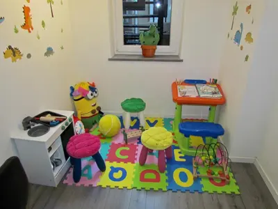 a childs play room with a table and chairs at Brunelleschi Holidays Hostel in Rome