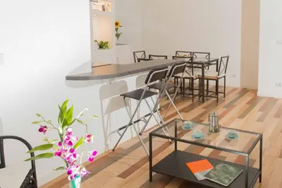 a group of tables and chairs in a room at B&B Domus Aurea in Rome