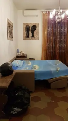 a room with a blue tub in a room at Robta's Dream Home in Rome
