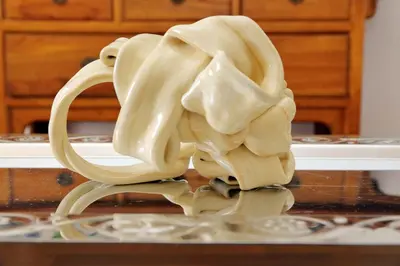 a sculpture of an elephant drinking out of a mug at YCH-Penthouse Fiammetta a Piazza Navona in Rome