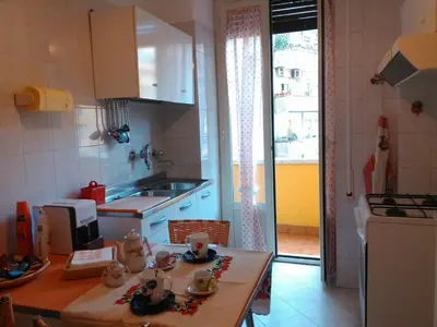 a kitchen with a table with figurines on it at Il Vostro Comfort in Rome