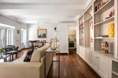 a living room with a couch and a table at The Pantheon view in the heart of Rome in Rome