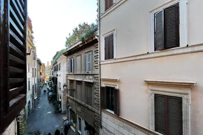 a view of an alley between two buildings at RomeAsYouLike-Monti Experience 295 in Rome
