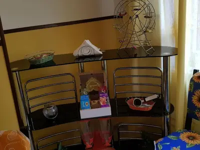 a shelf with a ferris wheel on top of it at Domina Romae B&B in Rome