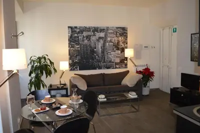 a living room with a couch and a table at Banchi Vecchi NY in Rome