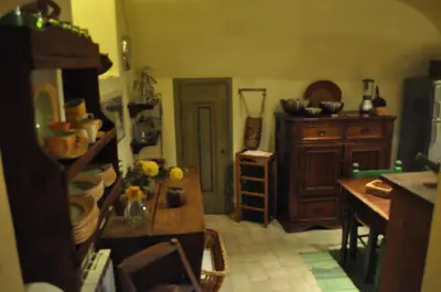 a kitchen with a table and a dining room at Onofrio Flat in Rome