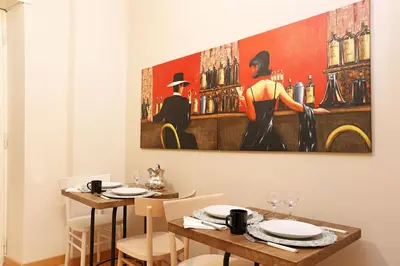 a painting of two men in a bar at Daplace - Ottavia Apartment in Rome