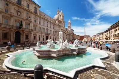 a fountain in the middle of a street in a city at Vicolo Vecchio 59 in Rome