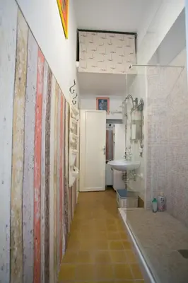 a bathroom with a toilet and a sink at Vicolo Vecchio 59 in Rome