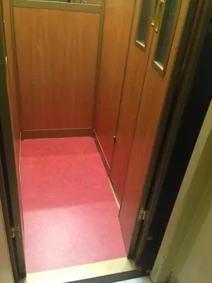 an open door with a pink rug in a room at Penthouse Angelo Brunetti in Rome