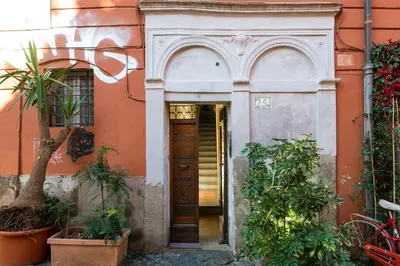 an entrance to a building with a door and plants at Al Cedro in Rome
