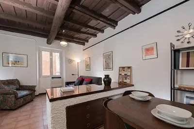 a living room with a couch and a table at Al Cedro in Rome