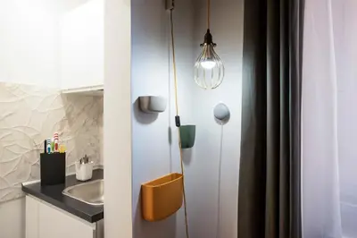 a bathroom with a sink and a mirror at Apartment Near Trevi Fountain in Rome