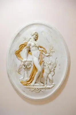 a glass plate with a woman and a man at Hotel Suite Caesar in Rome