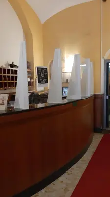 a counter with white objects on top of it at Hotel Altavilla in Rome
