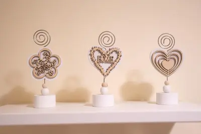 three hearts on a shelf in a room at Le Piazze di Roma Sweet Apartment in Rome