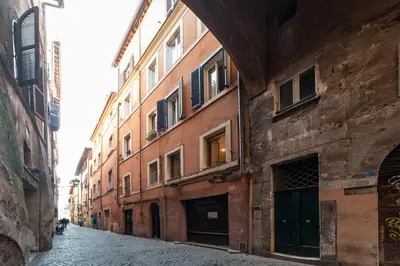 an alley in an old city with buildings at Deluxe Apartment - Campo dei Fiori in Rome
