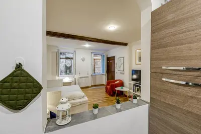 a living room with a couch and a table at Deluxe Apartment - Campo dei Fiori in Rome