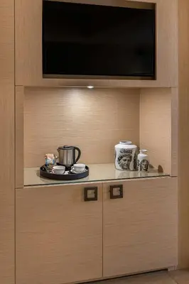 a flat screen tv on a wall in a kitchen at Starhotels Metropole in Rome